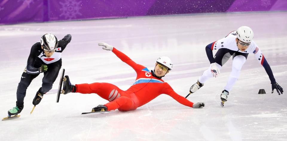 North Korean short-track speed skater Kwang Bom Jong slides on the ice. (EFE)