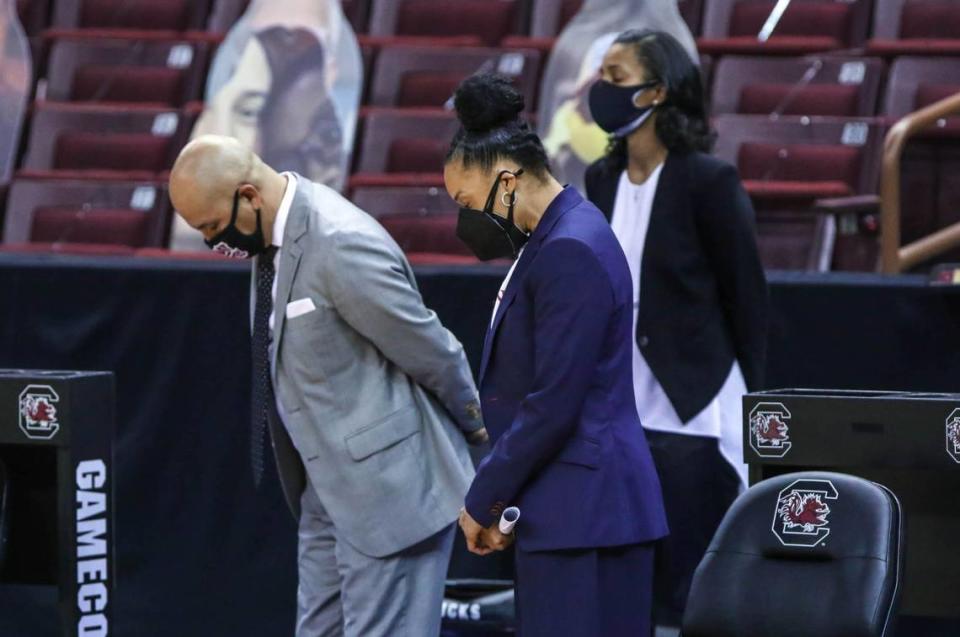 South Carolina Gamecocks head coach Dawn Staley and Assistant Coach Fred Chmiel stand for a moment of silence in honor of Temple Coach John Chaney, who died this week, before the Gamecocks played Alabama in the Colonial Life Arena in Columbia, SC.