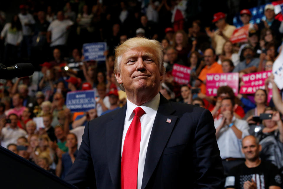 President Donald Trump, addressing criticism that Commerce Secretary Wilbur Ross and others in his Cabinet are too rich, said at an Iowa rally Wednesday that he doesn’t want poor people in charge of the economy.