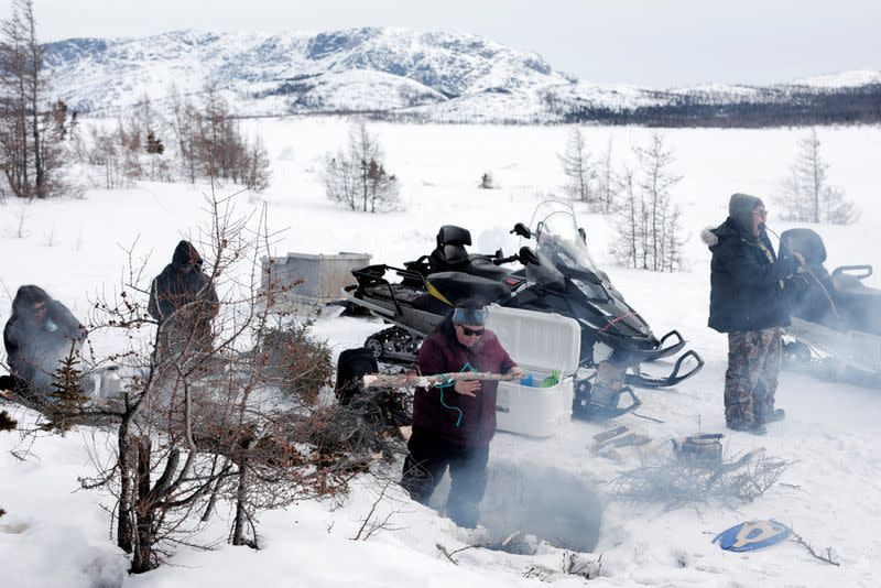 The Wider Image: Climate change means the Inuit do what they've always done: Adapt