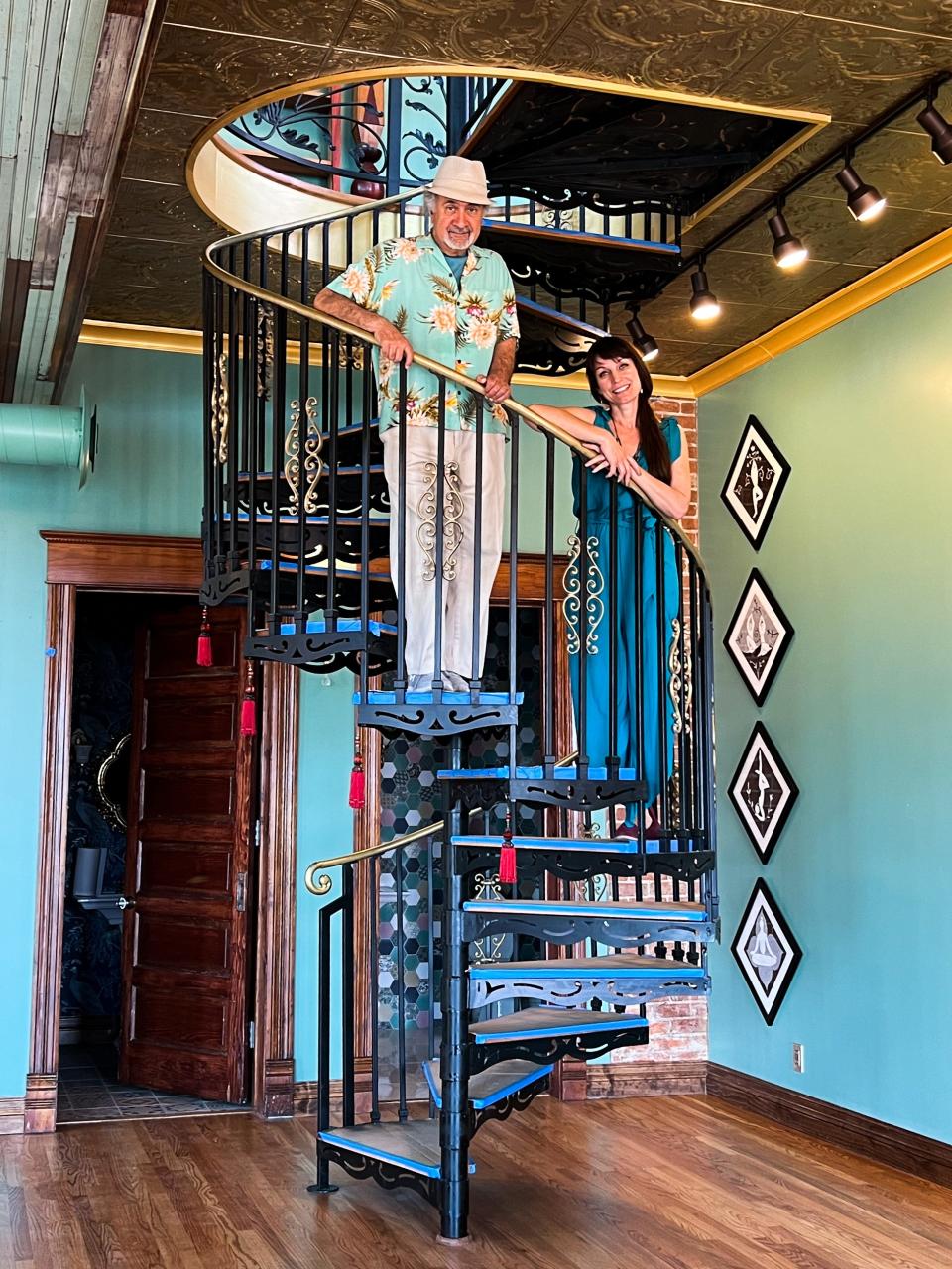 El Paso artist Hal Marcus and his daughter, Leilainia Marcus, stand on a spiral staircase at their venue, Sunset Parlor. Sunset Parlor, 1307 N. Oregon St., is across the road from the Hal Marcus Gallery at 1308 N. Oregon St.