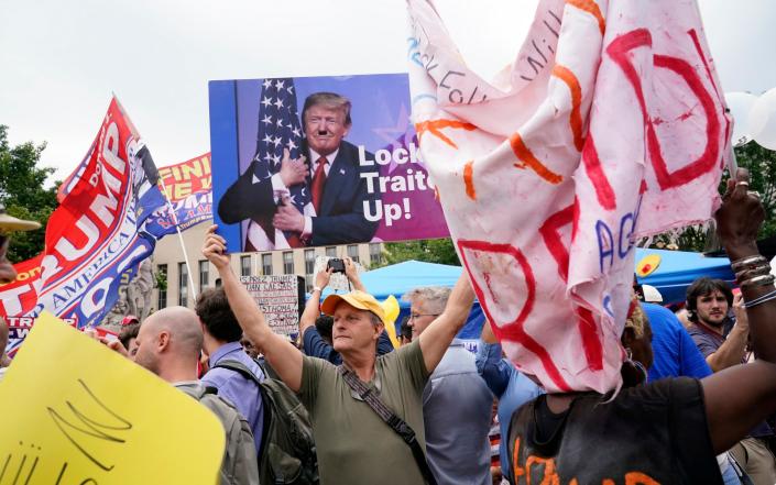 Supporters and opponents gathered outside the court in Washington