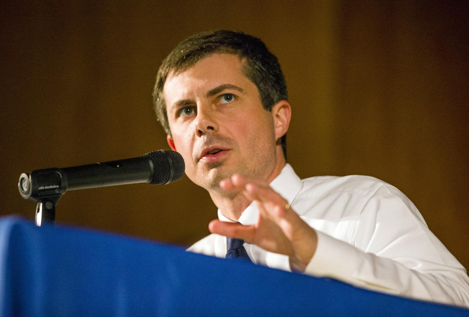 Democratic presidential candidate and South Bend Mayor Pete Buttigieg answers questions during a town hall community meeting, Sunday, June 23, 2019, at Washington High School in South Bend, Ind. Buttigieg faced criticism from angry black residents at the emotional town hall meeting, a week after a white police officer fatally shot a black man in the city. (Robert Franklin/South Bend Tribune via AP)