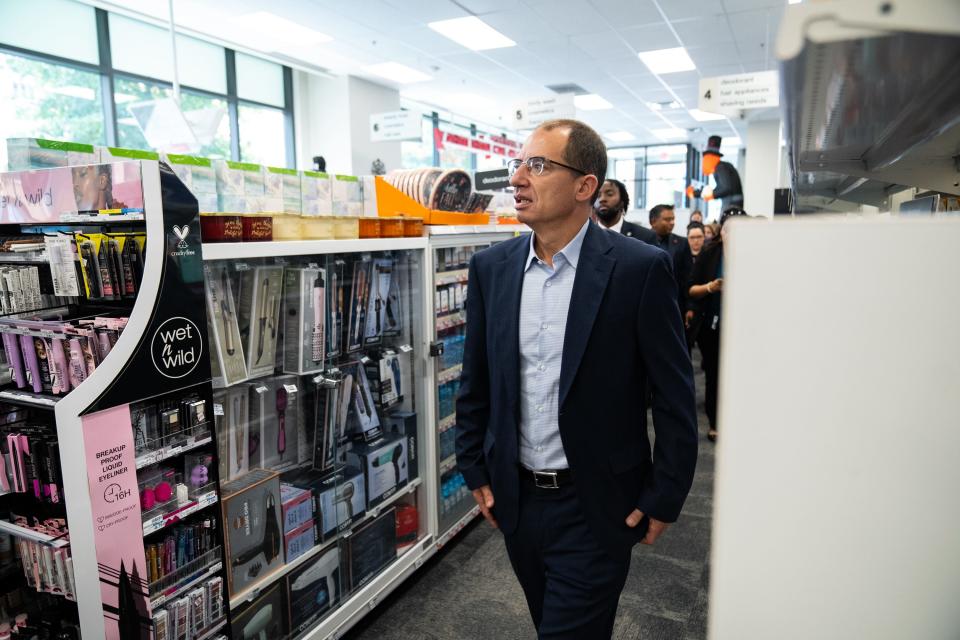 Stephane Bancel, CEO of Moderna, walks down an aisle after a press conference promoting COVID-19 booster shots at a CVS in Washington D.C. Wednesday, Sept. 20, 2023.