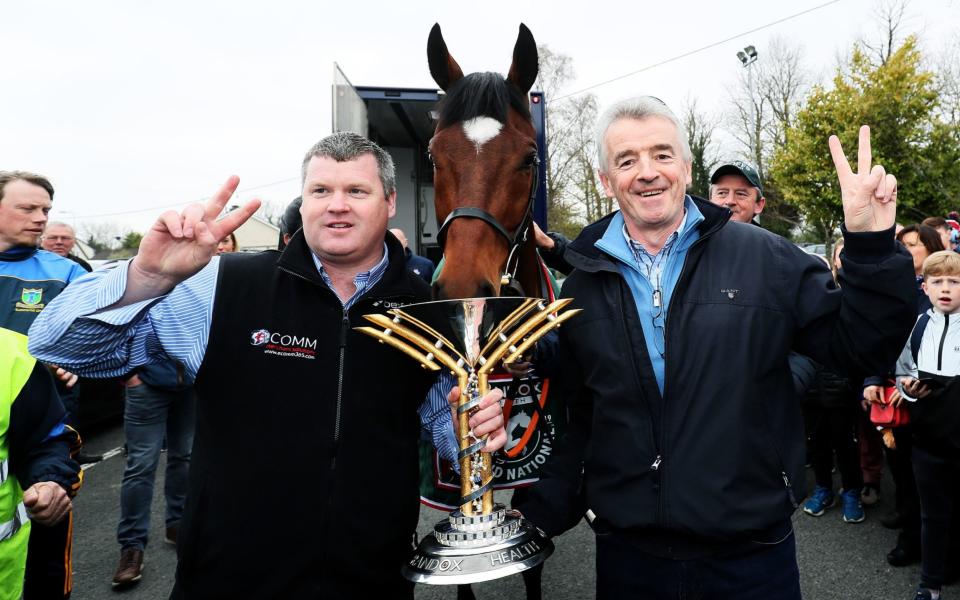 2019 Grand National Winner Tiger Roll with trainer Gordon Elliott (left), and owner Michael O'Leary  - PA