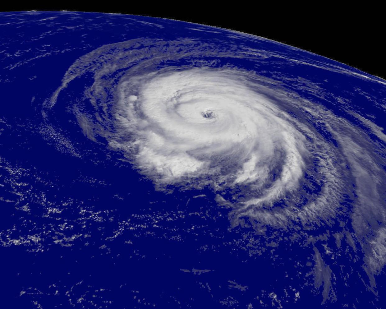 A satellite image shows Hurricane Helene churning over the Atlantic Ocean in 2006. Hurricanes have grown more intense in recent years, though their overall number has declined.