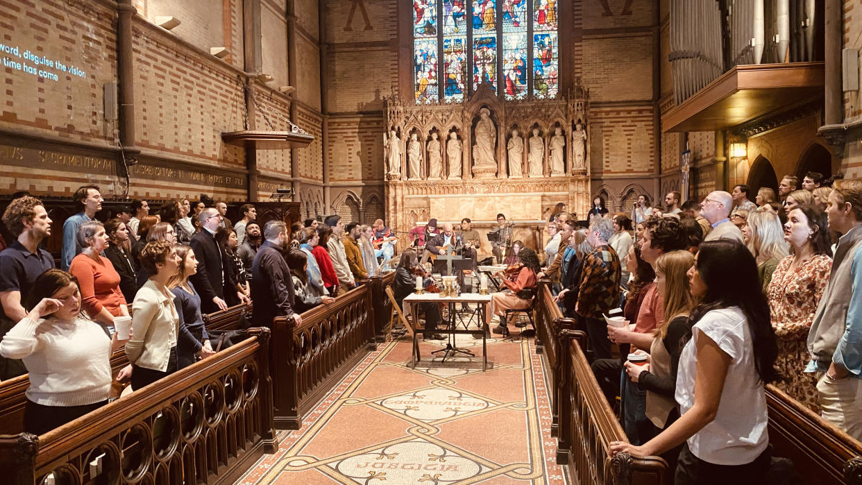  The interior of a church service with happy congregants. . 