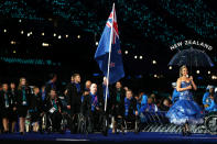 LONDON, ENGLAND - AUGUST 29: Shooter Michael Johnson of New Zealand carries the flag during the Opening Ceremony of the London 2012 Paralympics at the Olympic Stadium on August 29, 2012 in London, England. (Photo by Clive Rose/Getty Images)