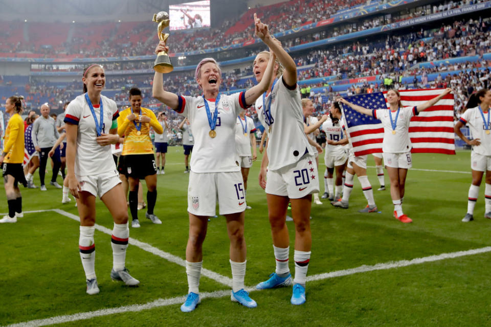 Alex Morgan, Megan Rapinoe and Allie Long celebrate their win of the FIFA Women's World Cup on July 7, 2019 in Lyon, France. (Rico Brouwer/Soccrates/Getty Images)