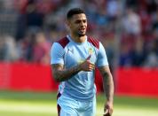 <p>Burnley’s Andre Gray shows his appreciation</p>