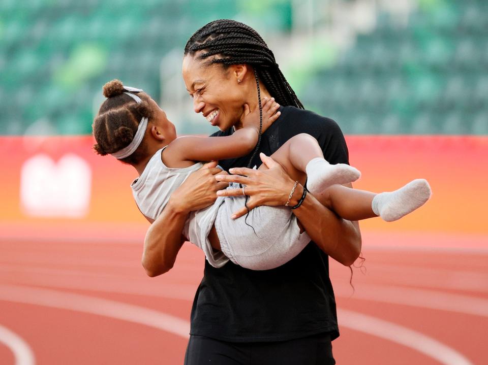 Allyson Felix celebrates with her daughter Camryn after day nine of the 2020 U.S. Olympic Track & Field Team Trials at Hayward Field on June 26, 2021 in Eugene, Oregon.