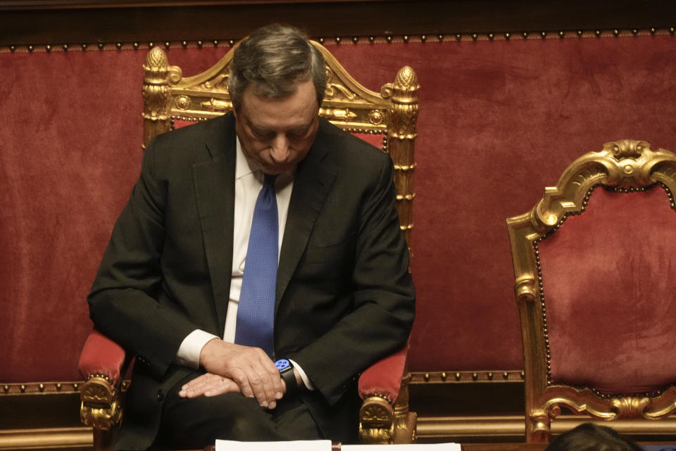 Italian Premier Mario Draghi attends a debate at the Senate in Rome, Wednesday, July 20, 2022. Draghi was deciding Wednesday whether to confirm his resignation or reconsider appeals to rebuild his parliamentary majority after the populist 5-Star Movement triggered a crisis in the government by withholding its support. (AP Photo/Gregorio Borgia)