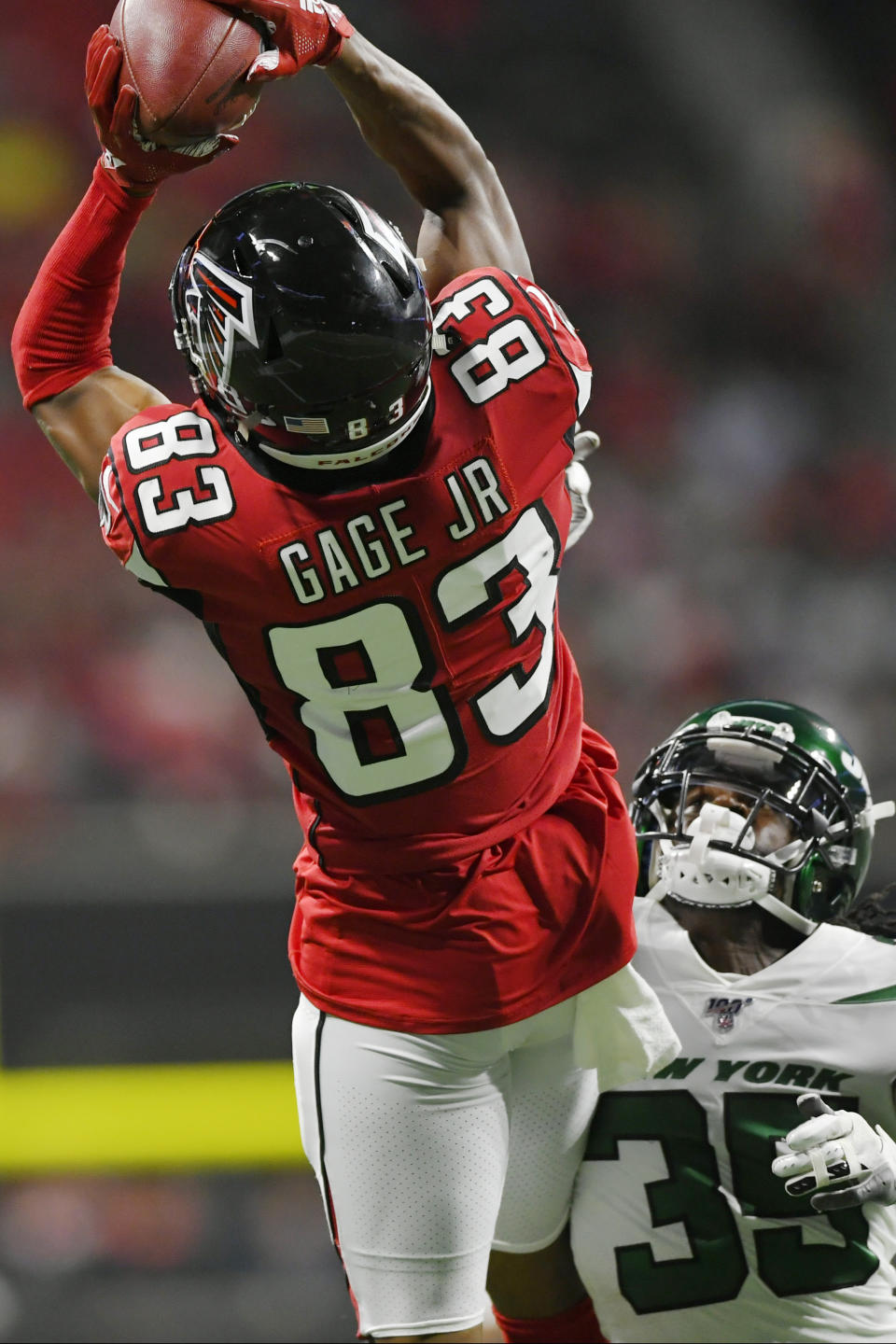 New York Jets defensive back Tevaughn Campbell (35) tackles Atlanta Falcons wide receiver Russell Gage (83) during the first half an NFL preseason football game, Thursday, Aug. 15, 2019, in Atlanta. (AP Photo/John Amis)