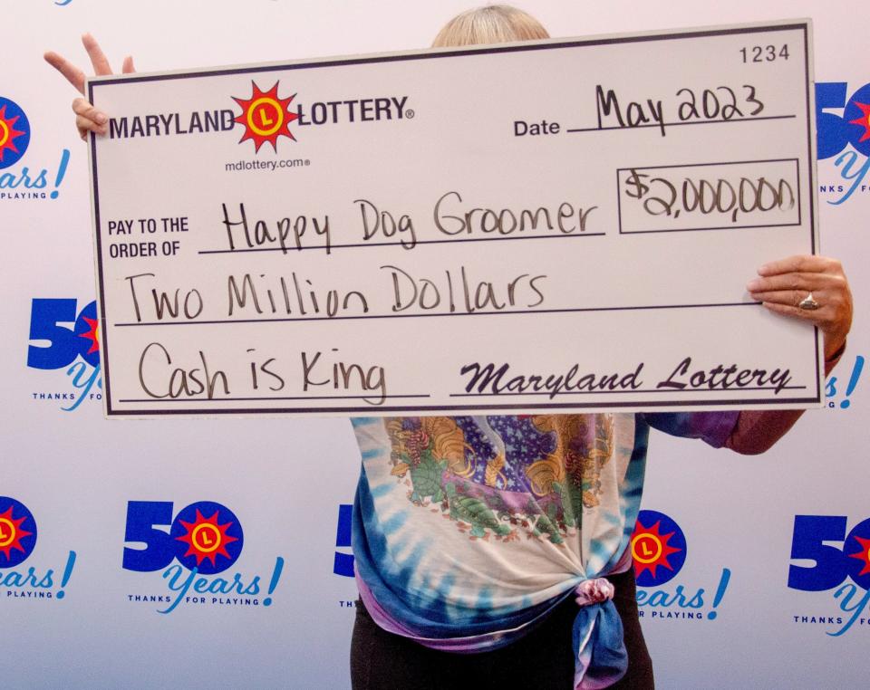 A Hagerstown woman who chose to go by the nickname "Happy Dog Groomer," has won $2 million through a Maryland Lottery scratch-off game. The lottery allows winners to remain anonymous.