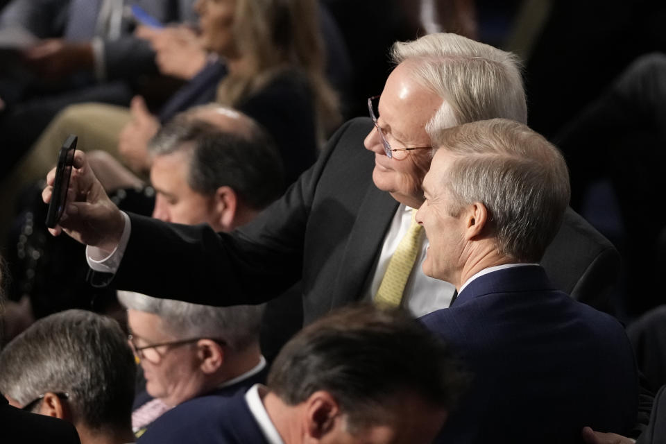 FILE - Rep. Jerry Carl, R-Ala., talks a selfie with Rep. Jim Jordan, R-Ohio, as Republicans try to elect Jordan to be the new House speaker, Oct. 17, 2023, at the Capitol in Washington. Carl is running for the 1st Congressional district seat in Alabama. (AP Photo/Alex Brandon, File)