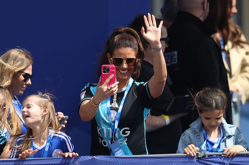 Rebekah Vardy waved to fans from the open top bus