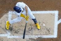 Milwaukee Brewers' Willy Adames hits a single during the first inning of a baseball game against the Philadelphia Phillies Sunday, Sept. 3, 2023, in Milwaukee. (AP Photo/Morry Gash)