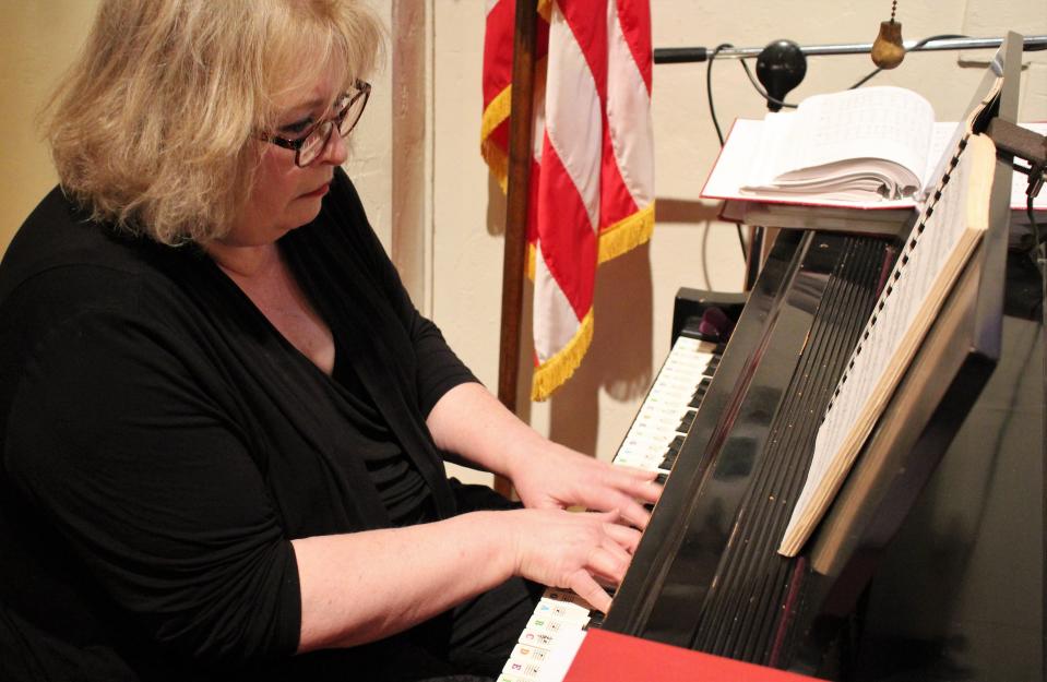 Suzanne Fusaro moves from the organ to the piano to play a hymn during the offertory. On this particular Sunday at Bethel Lutheran Church, it was "Amazing Grace."