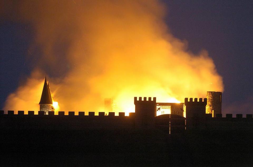 The landmark castle on Versailles Rd. just outside of Lexington in Woodford County on fire, May 10, 2004. Lexington contractor Rex Martin Sr. started building the castle in 1969. But it was never finished and sat empty for more than 30 years. Tom Post spent millions of dollars and several years rebuilding the landmark into a bed and breakfast. Improvements started by Post were nearly complete when the fire destroyed the building. The state fire marshal’s office concluded there was “a high probability” that an arsonist set the fire, but nobody was ever charged.