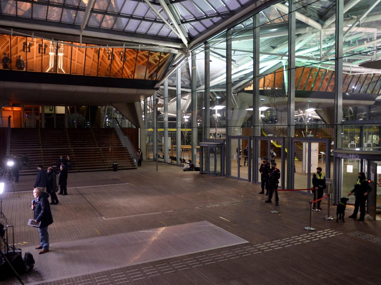 Police officers stand guard before a trial of Iranian diplomat Assadollah Assadi, charged in Belgium with planning to bomb a meeting of an exiled Iranian opposition group in France (REUTERS)