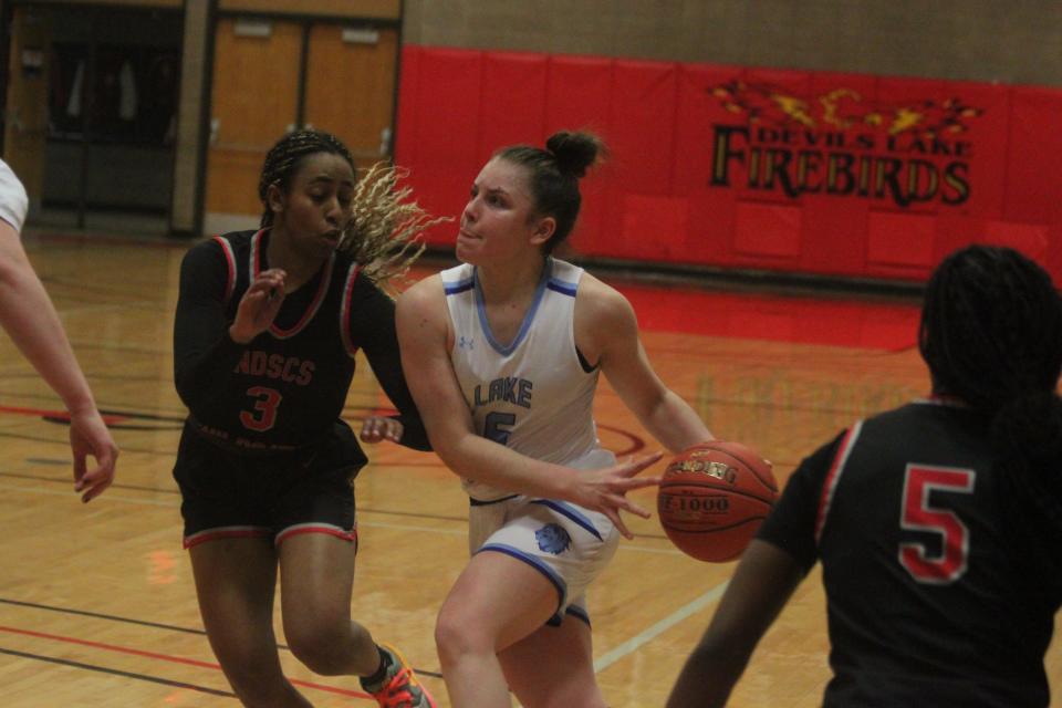 Lake Region State guard Tiziana Huici dribbles around the North Dakota State College of Science defense on Jan. 19.