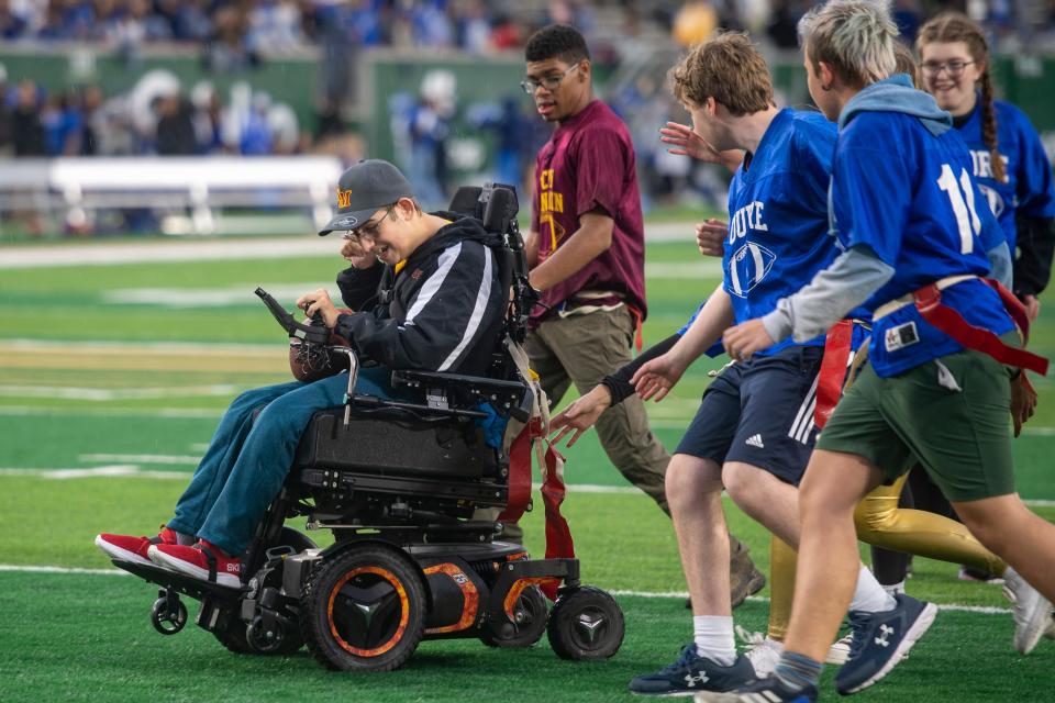 Rocky Mountain High School unified football team takes on Poudre High school during halftime during the Canvas Community Classic football game at Canvas Stadium in Fort Collins on Sept. 30, 2022.