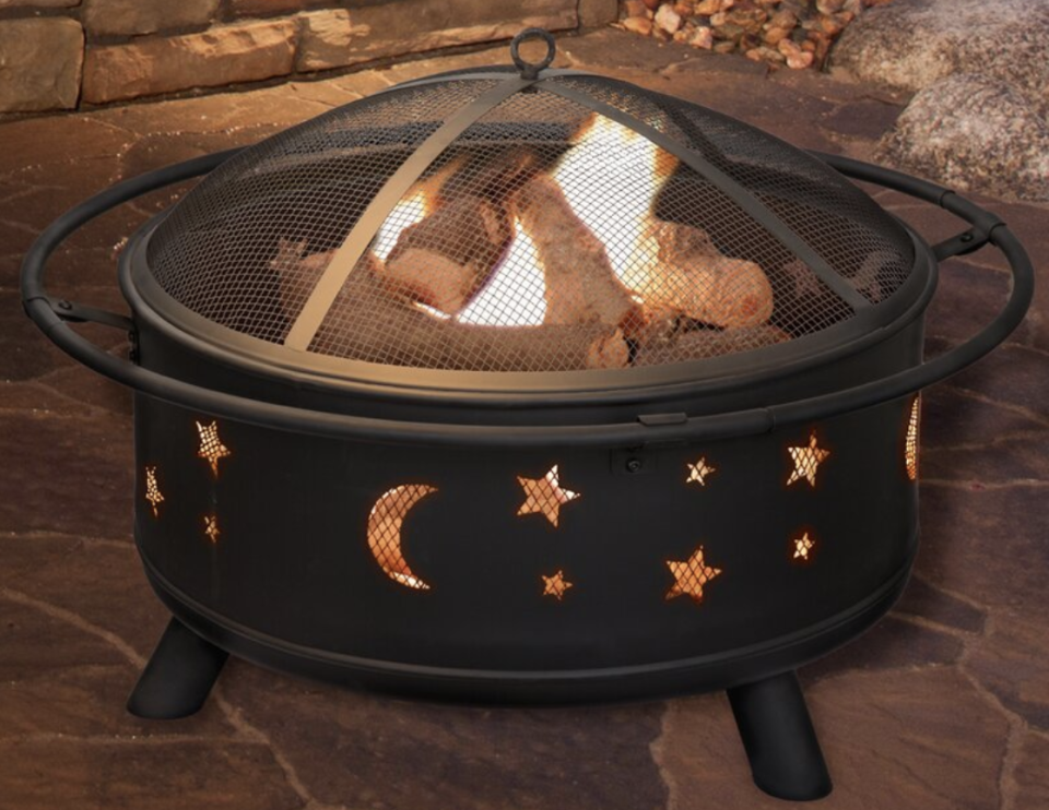 Wayfair has a sale on fire pits and they'll totally transform your backyard. (Credit: Wayfair)