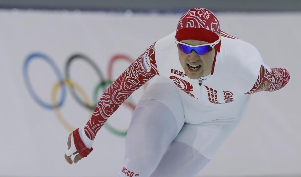 Russia's Denis Yuskov skates during the men's 5,000m speed skating race at the Adler Arena during the 2014 Sochi Winter Olympics February 8, 2014. REUTERS/Phil Noble (RUSSIA - Tags: OLYMPICS SPORT SPEED SKATING)