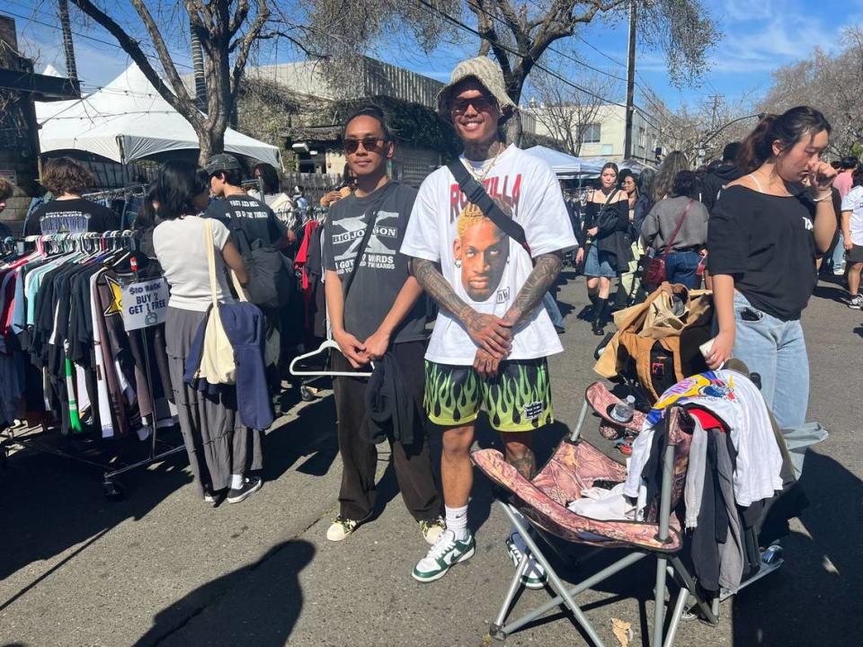 Shaundy Ravanal, left, and Jessie Diez at the front of their booth called “Chasin’ Nostalgia.” FIT CHECK: Diez is wearing a 1998 Dennis Rodman t-shirt from Ebay, Nike Spartan dunks and pants from his clothing brand called “5200.” Hanh Truong/htruong@sacbee.com
