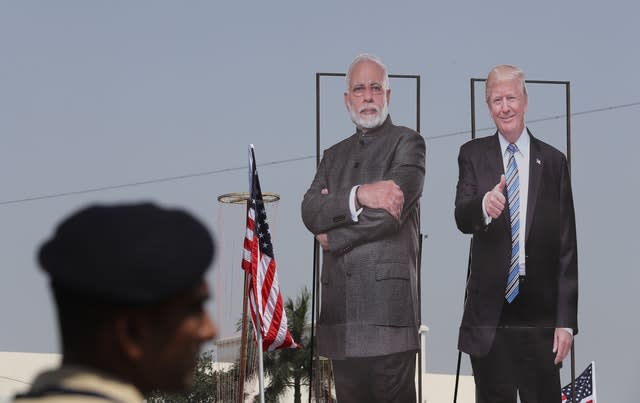 India has rolled out the red carpet for Donald Trump, with his image appearing across Ahmedabad