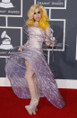 Always the showstopper, Gaga appears again in our list after stunning on the Grammys red carpet in 2012 wearing a purple spiral dress and meteoric shoes.
