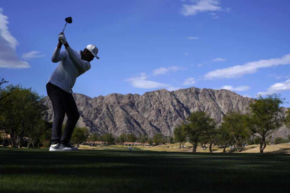 Tony Finau hits from the third tee during the third round of the American Express golf tournament on the Pete Dye Stadium Course at PGA West Saturday, Jan. 22, 2022, in La Quinta, Calif. (AP Photo/Marcio Jose Sanchez)