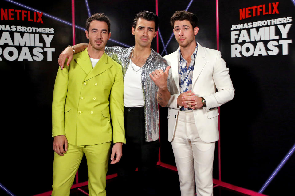 <p>Kevin, Joe and Nick Jonas stop for a photo while filming their Netflix special, <em>Jonas Brothers Family Roast, </em>on Nov. 23 in Los Angeles. </p>