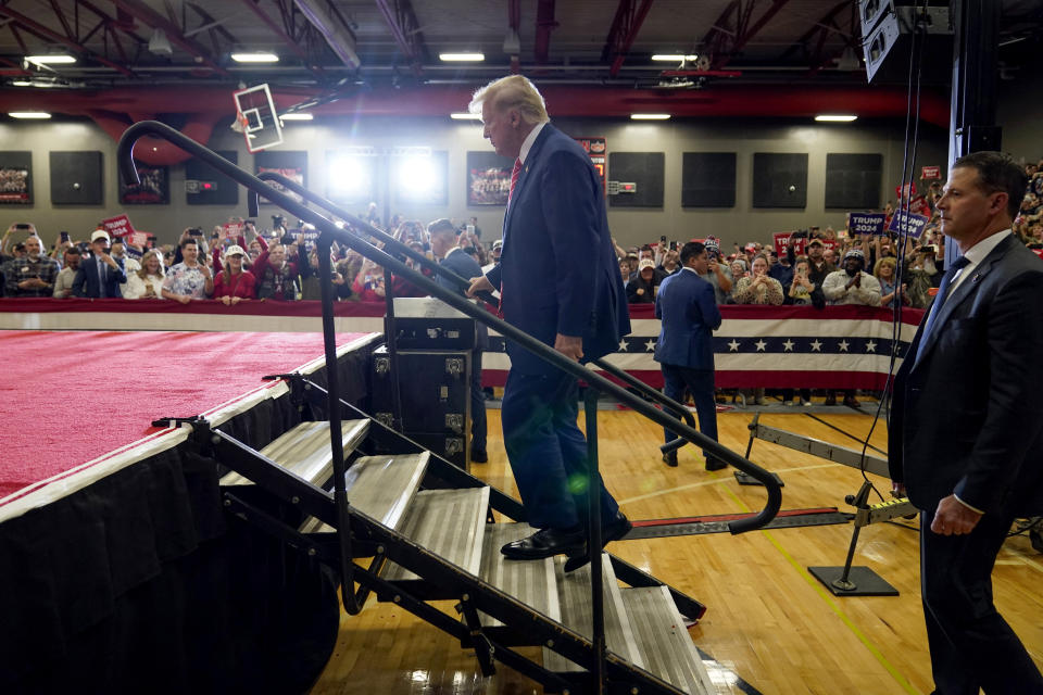 FILE - Republican presidential candidate former President Donald Trump arrives to speak at a commit to caucus rally, Jan. 6, 2024, in Clinton, Iowa. In 2024, Iowa will again hold the first Republican contest. (AP Photo/Charlie Neibergall, File)