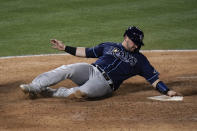 Tampa Bay Rays' Mike Zunino scores on a double by Brett Phillips during the eighth inning of the team's baseball game against the Los Angeles Angels, Thursday, May 6, 2021, in Anaheim, Calif. (AP Photo/Jae C. Hong)
