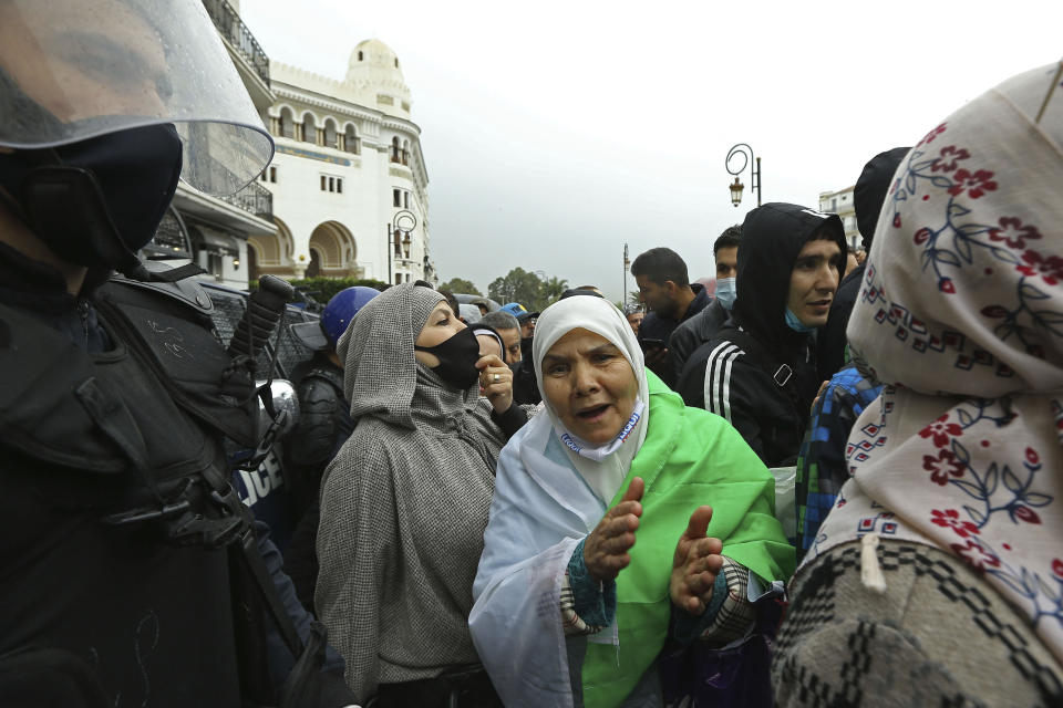 Women take part to demonstration in Algiers to mark the second anniversary of the Hirak movement, Monday Feb. 22, 2021. February 22 marks the second anniversary of Hirak, the popular movement that led to the fall of Algerian President Abdelaziz Bouteflika. (AP Photo/Anis Belghoul)