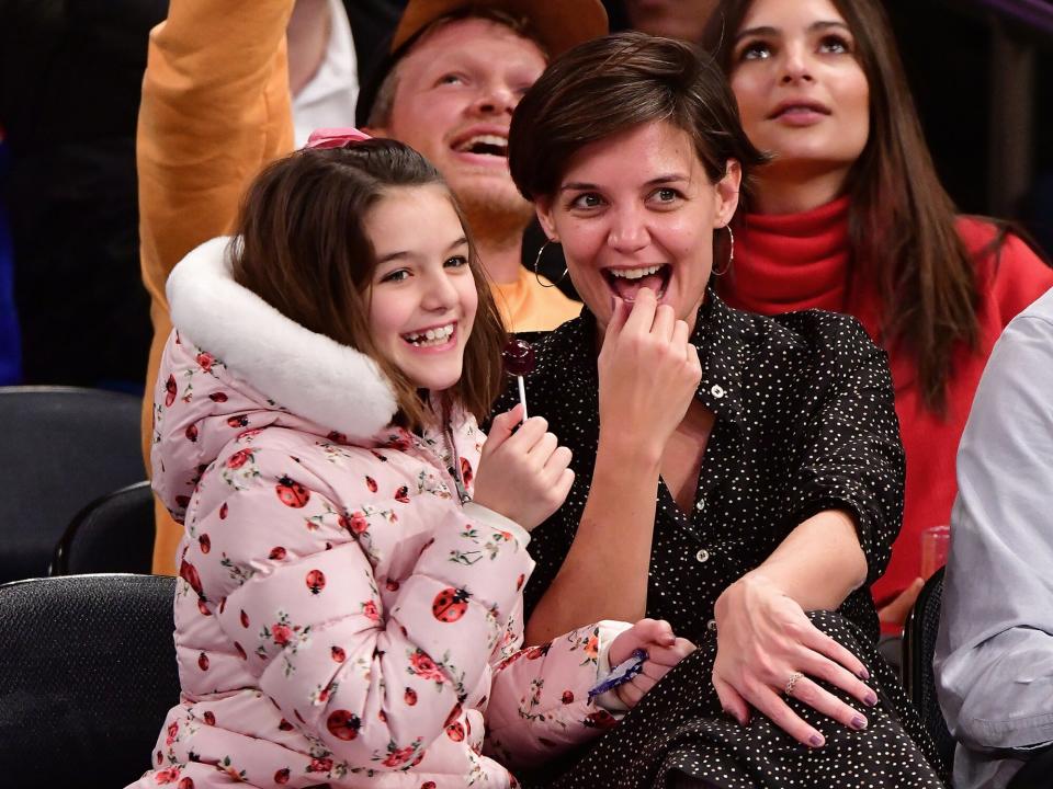 Suri Cruise and Katie Holmes attend the Oklahoma City Thunder Vs New York Knicks game at Madison Square Garden on December 16, 2017 in New York City