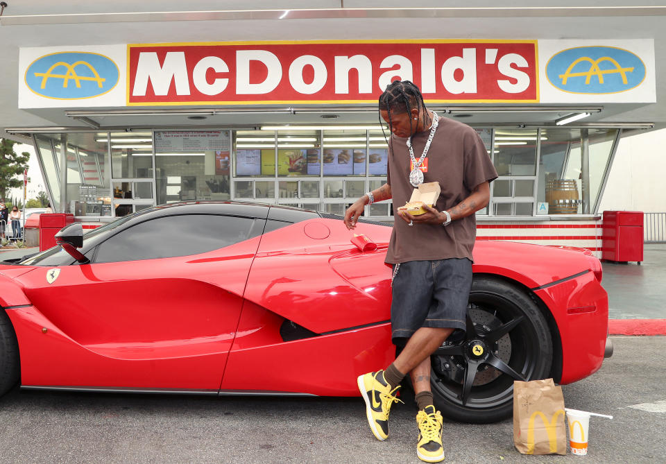 DOWNEY, CALIFORNIA - SEPTEMBER 08:  Travis Scott surprises crew and customers at McDonald's for the launch of the Travis Scott Meal on September 08, 2020 in Downey, California. (Photo by Jerritt Clark/Getty Images for McDonald's)