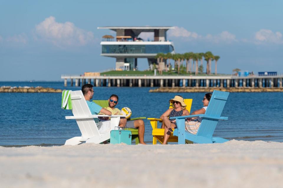 St. Pete Pier includes a fishing deck, picnic area, splash pad, playground, a marketplace, discovery center, a nature walk as well as a beach area with colorful chairs for lounging.