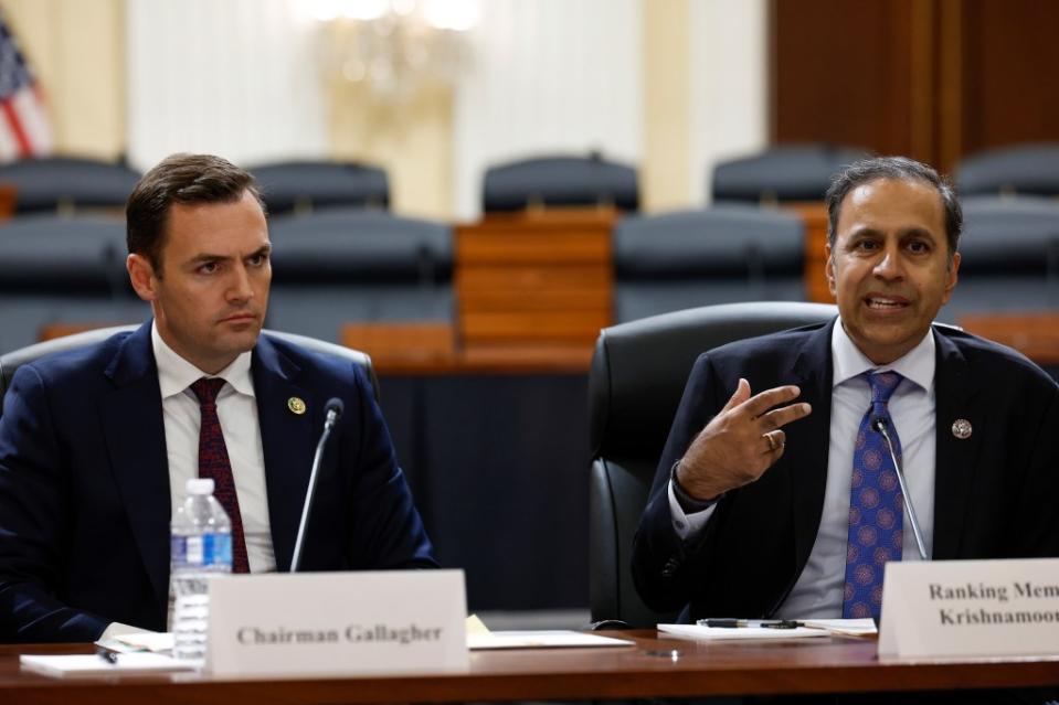 WASHINGTON, DC - NOVEMBER 15: Ranking Member Raja Krishnamoorthi (R-IL) (R) speaks as Chairman Mike Gallagher (R-WI) (L) listens during a press conference with members of the House Select Committee on the Chinese Communist Party at the Cannon House Office Building on November 15, 2023 in Washington, DC. The committee held the news conference to speak about their Reedley Bio Lab investigation report and evidence of illegal activity within the facility. (Photo by Anna Moneymaker/Getty Images)