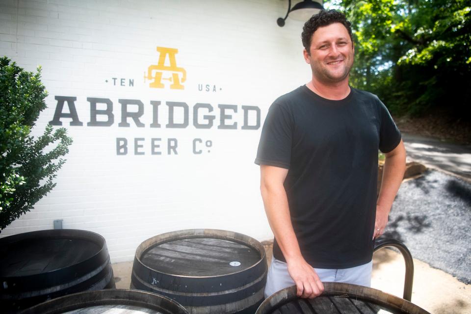 Abridged Beer Company founder Jesse Bowers is photographed outside of Abridged's West Knoxville location at 100 Lockett Road on Thursday, July 28, 2022. Abridged will be opening an additional location at the former K Town Tavern spot on N. Peters Road. 