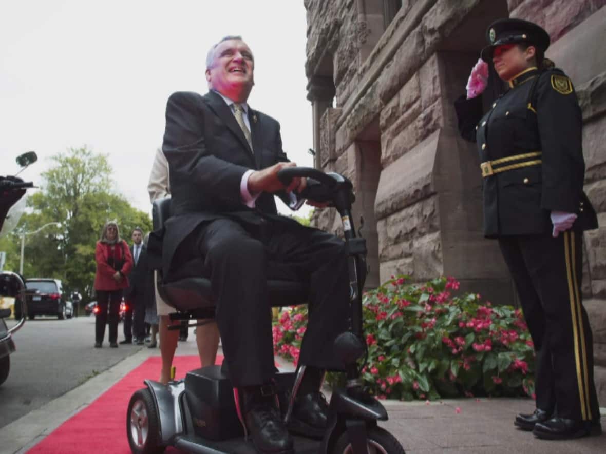 David Onley served as Ontario's 28th lieutenant-governor from 2007 to 2014. He was the first person with physical disabilities to take on the role, he was partially paralyzed from the neck down at age three by polio and used leg braces, a cane and his motorized scooter to get around. (CBC - image credit)