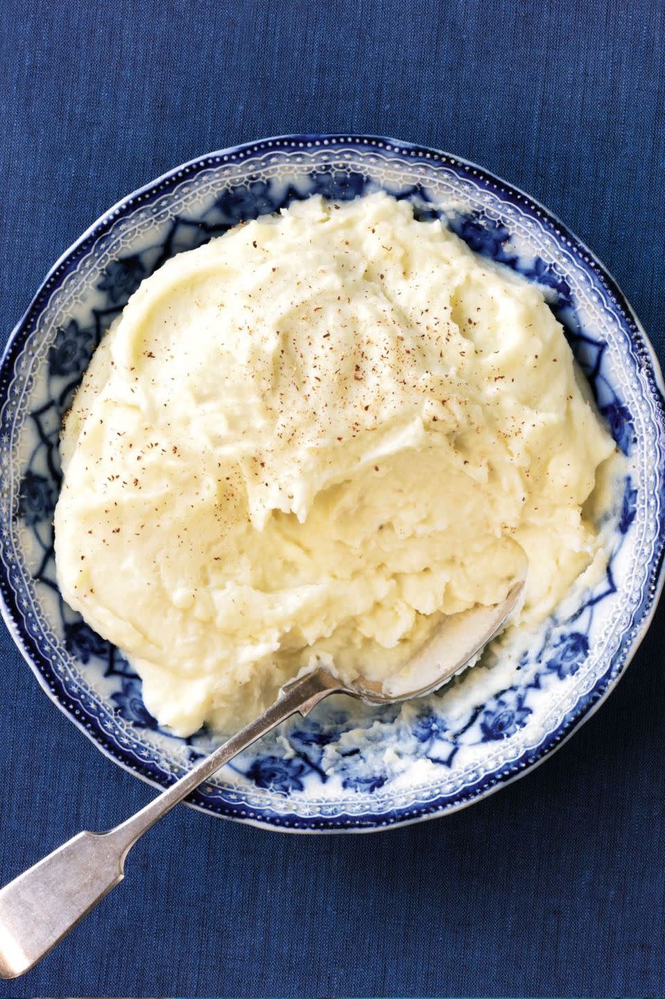 <p>These tasty herb mashed potatoes take your regular mashed potatoes from bland to flavorful. This is a classic dish that makes the perfect side for any entree. </p><p><strong><em><a href="https://www.womansday.com/food-recipes/food-drinks/recipes/a9801/rosemary-garlic-mashed-potatoes-recipe-120864/" rel="nofollow noopener" target="_blank" data-ylk="slk:Get the Rosemary-Garlic Mashed Potatoes recipe;elm:context_link;itc:0;sec:content-canvas" class="link ">Get the Rosemary-Garlic Mashed Potatoes recipe</a>.</em></strong></p>