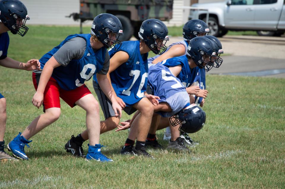 The Hornets practice punt protection and punt coverage.