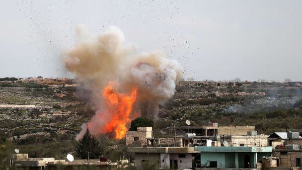 PHOTO: An explosion following Russian air strikes on the village of al-Bara, Syria, March 5, 2020. (Omar Haj Kadour/AFP via Getty Images)