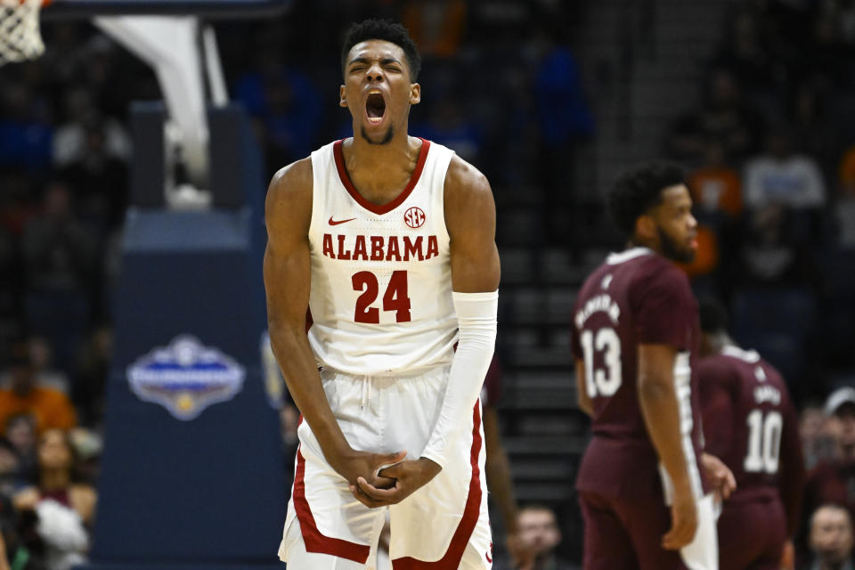 Alabama forward Brandon Miller (24) and the Crimson Tide are the top overall seed in the NCAA tournament. (AP Photo/John Amis)