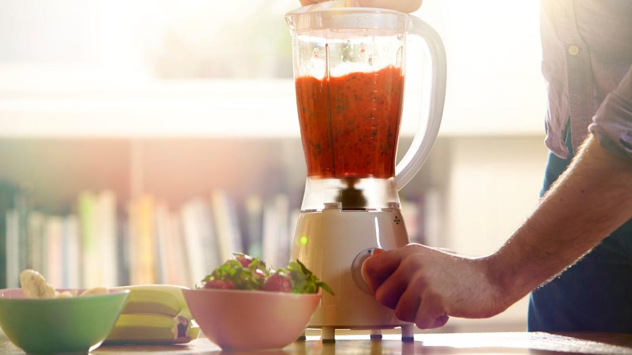  Blender with smoothie on a kitchen surface 