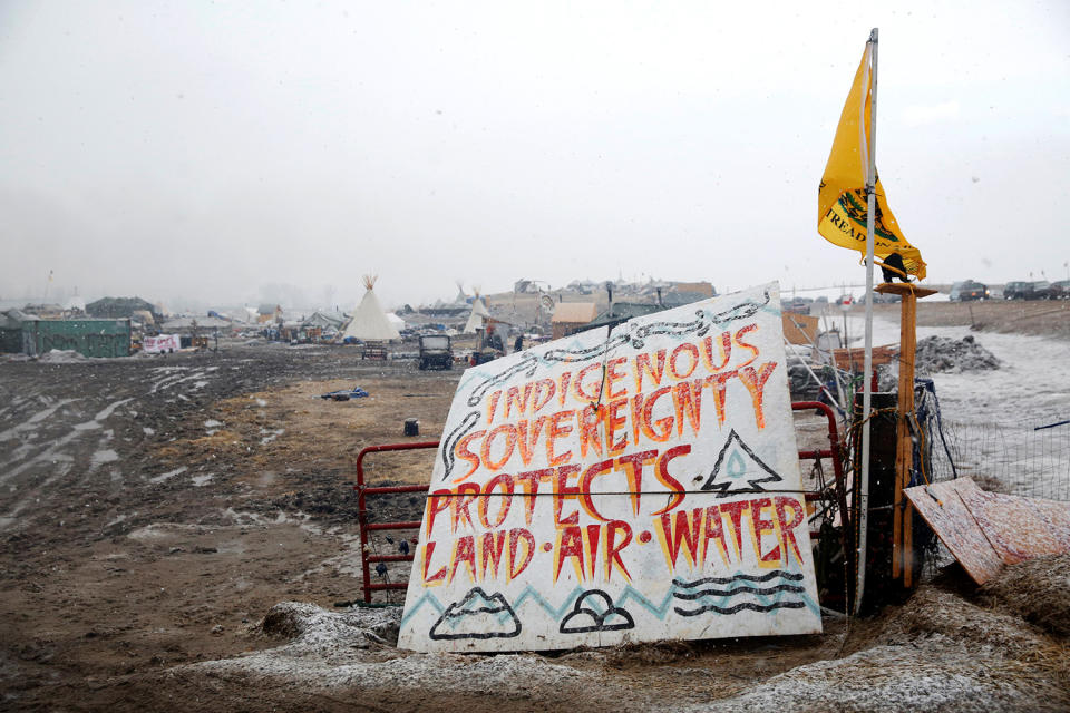 <p>A sign stands at the entrance of the main opposition camp against the Dakota Access oil pipeline, near Cannon Ball, N.D., Feb. 22, 2017. (Photo: Terray Sylvester/Reuters) </p>