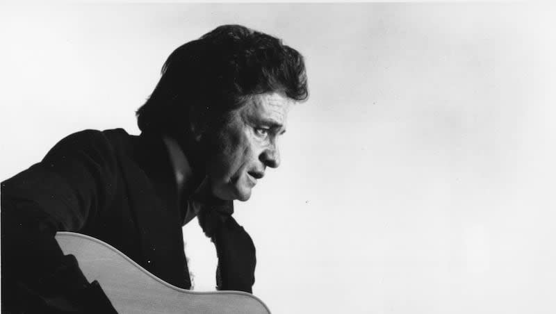 Johnny Cash is pictured playing the guitar. Cash’s song "The Chicken in Black" was recently one of TikTok’s most popular songs.