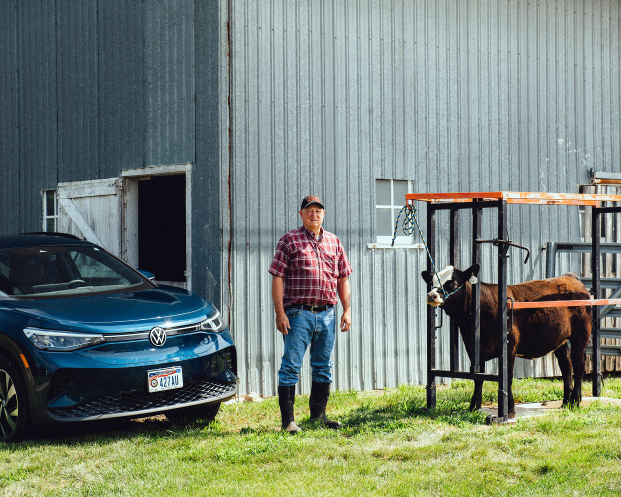 James Zvolanek, who drives one of the few electric vehicles in town, at his farm in Wymore, Neb., on June 16, 2024.   (George Etheredge/The New York Times)